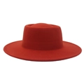 Close-up of vibrant red wool felt boater hat with wide brim and fine stitching detail - Adult (57-60cm) / Rust red