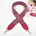 Detail of pink jacquard strap with gold metal buckle and PU leather connection - Rose Pink/Khaki + Rose Red Leather
