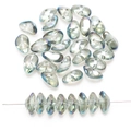 Close-up of irregular iridescent glass beads in blue-green and taupe for DIY jewelry - Transparent Green
