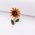 Broche tournesol orange avec pétales en émail jaune et cœur en cristal noir - Tournesol - Orange