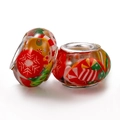 Pair of Christmas themed glass beads featuring snowflake and candy cane patterns - Christmas Mix