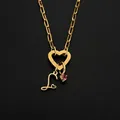 Stainless steel heart clasp necklace with initial L and pink gem pendant in gold - S