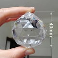 Detailed view of 40mm clear faceted crystal ball with multi-angle light refraction - Spherical Transparent (40mm)