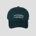 Close-up of white letter embroidery on dark green cotton twill fabric of the baseball cap - M (56-58cm) / Green