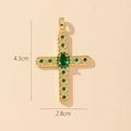 Detail of a gold-plated cross pendant with green stones and 4.3cm by 2.8cm dimensions - Style B-Green Zirconia Cross
