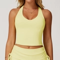 Top sportivo giallo chiaro a lupetto con scollo a V e tessuto elasticizzato - S / Giallo Germoglio