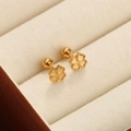 Gold clover-shaped titanium steel studs displayed in a beige velvet jewelry box - Four-Leaf Clover / Gold
