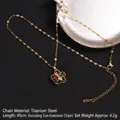 Golden titanium steel spinning flower necklace with colorful zircons and lip chain - Multi-color Rhinestone Hollow Flower (A697)