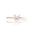 Detailed macro view of butterfly shaped colorful zircon stones set in a rose gold ring - White Zircon Butterfly-Rose Gold