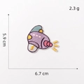 Detailed view of a purple cartoon airplane embroidery patch with 5.9x6.7cm dimensions - 7# Rocket