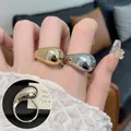 Minimalist teardrop rings in polished gold and silver finishes with adjustable band - Minimalist Teardrop Shape/Two-tone