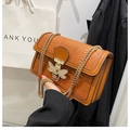 Brown crocodile texture shoulder bag with gold bee buckle and chain strap - Brown
