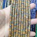 Macro shot of natural 3x6mm jasper and agate spacer beads for DIY jewelry making - Bamboo Leaf Stone