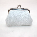 Close-up of white crochet lace texture and silver metal clasp on a mini coin purse - Mini Size / White