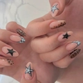 Almond-shaped press-on nails with dark crocodile texture and black star patterns - Bz2070 Shines / Jelly Glue + Nail File