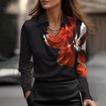 Detail der schwarzen Satin-Bluse mit orangefarbenem Blumendruck und glattem Kragen - Schwarz Blumig