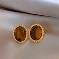 Detailed view of vintage gold stud earrings featuring oval tiger eye stones on silk fabric - 28# Oval Resin Stud Earrings with Silver Earring Post
