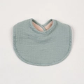 Close-up of the grey-green muslin cotton baby bib showing fine stitching and layered texture - Bean Green