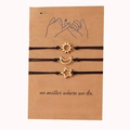 Detailed view of sun moon and star friendship bracelets with Pinky Promise card - Couples (B00548) / Three-Piece Set / Gold