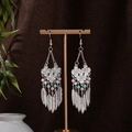 Detail of silver bohemian earrings with turquoise beads and metallic feather charms - Multicolor Silver (E1222-2)