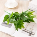 Artificial green ivy leaves bundle for wedding decor and home interior greenery - 7-Fork Scindapsus
