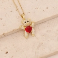 Detailed close-up of golden bear pendant with red heart stone and zircon stones - Red Heart Clear Zircon Bear (27#)