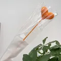 Handmade crochet heart flower in bright orange with LOVE packaging and green leaf decor - Orange Heart Branch