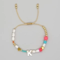 Adjustable woven bracelet with letter K, pearls, golden heart and star charms - Letter K Style (ZZ-B24061901K-F)