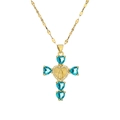Collana a croce d'oro con gemme blu a cuore e ciondolo con rilievo della Madonna - Blu lago