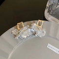 Elegant white petal drop earrings with gold geometric accents on a tray - Shell Petal Geometric Earrings (20# Silver Post)