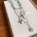 Detail of silver multi-layer necklace with turquoise beads and western charms - 38# Necklace - Silver Pendant