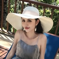 Elegant wide brim white straw sun hat for women featuring a minimalist summer beach style - One Size / Solid Milk White