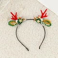 Diadema navideña con cuernos rojos, pompones verdes y estrellas doradas en fondo marfil - Diadema de astas de reno de Navidad Modelo J