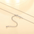 Macro detail of silver bead necklace showing secure spring clasp and extension chain - XL1198 Bead Ball Chain