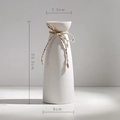 White ceramic vase with hemp rope bow accent, dimensions 23.3cm height and 9cm base - Rainbow Flying Vase