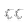 Macro detail of high-shine silver hollow bead C-shaped hoop earrings with metallic finish - Silver C-Shape Beads