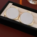 Macro shot of triangular gold and white shell earrings on a beige velvet jewelry pad - 10# Silver Needle-Golden Triangle Mother of Pearl