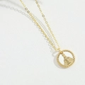 Golden religious pendant necklace featuring a round white medallion with a detailed icon - Religious Virgin Mary (Queen)