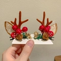 Detail of Christmas reindeer antler hair clips with red berries and pine cones - 15# White Gauze Red Bead Pair