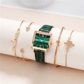 Elegant green square quartz watch set with four gold bracelets on display - Watch + Bracelet Set / Green
