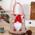 Christmas burlap gift bag with a 3D gnome applique and red striped handles - Faceless Gnome Heart Bag