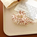 Creamy white hair claw clip with reddish-brown ink splatter pattern on a tray - Seashell Coffee (Plastic)