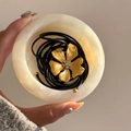 18k gold plated titanium steel flower pendant with rhinestones and black leather cord - Gold