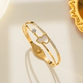18K gold plated titanium steel bangle with double ring design and white shell clover - Real Shell Gourd Bracelet / Gold