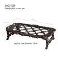 Vintage 8-slot cast iron egg holder with ornate legs and rustic bronze finish - 8-Hole Vintage Cast Iron Egg Holder