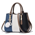 Modern tricolor stitched leather tote in blue, white, and black with pearl bag charm - Khaki