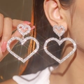 Elegant silver heart earrings with sparkling crystals in a double nesting design - Silver Double Heart Pendant Style (LDE1019S)