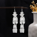 Vintage silver tassel earrings with bohemian flower filigree and hollow engraved details - Filigree Hollow Carved Long Tassel Style (E4711-1)