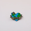 Close-up of a heart-shaped earth cartoon badge with a flower and LOVE banner - Love Heart Shape Earth Cartoon Pin (C2263)