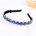 Luxe black headband with blue diamond-shaped crystals and sparkling white rhinestones - Blue